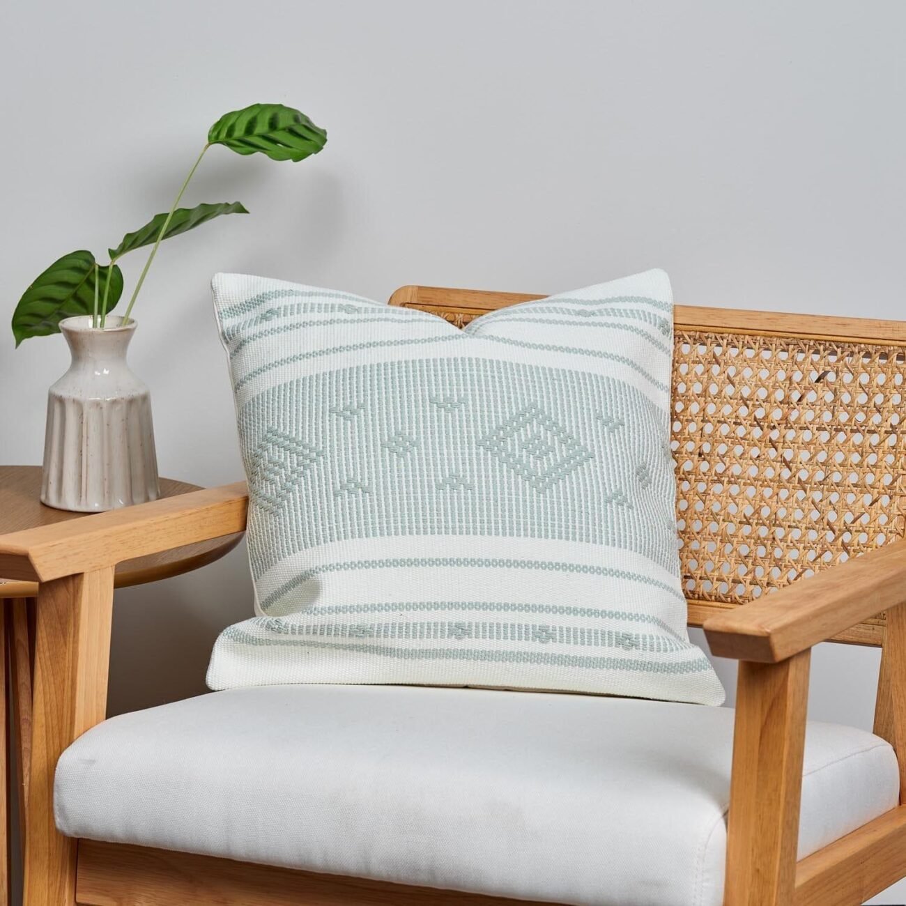 green-aztec-embroidered-cushion-cover